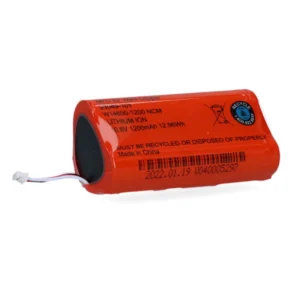 Accu van een tondeuse in het rood.