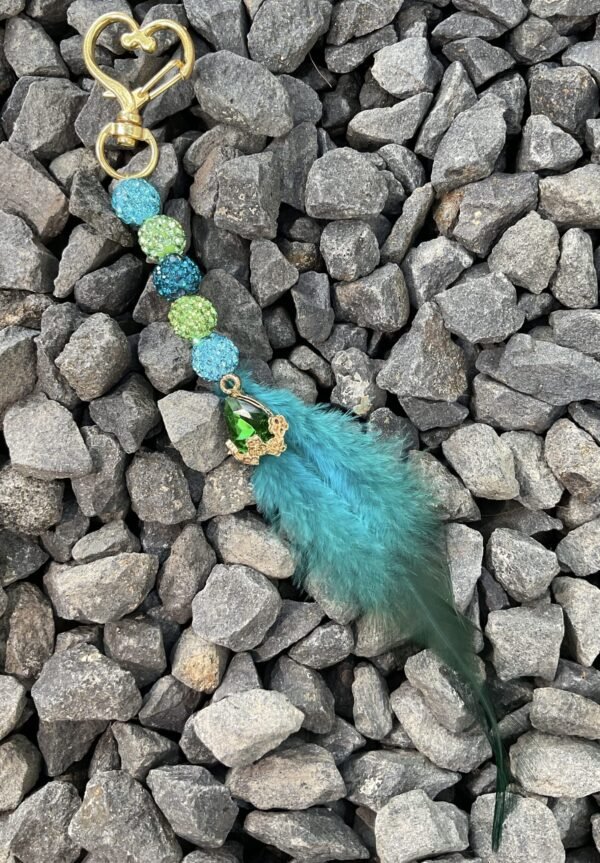 Unieke Sparkle Feather Hanger met gouden clip